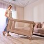 Patut pliant multifunctional, Lionelo, Ellen, Cu laterala culisanta, Nivel suplimentar, Intrare laterala cu fermoar, 2 roti, Saltea pliabila si geanta de transport incluse, 0- 36 luni, Pana la 15 kg, 120x60 cm, Conform cu  EN 716, Bej - 22