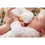 Set 4 x biberoane, Philips Avent, Natural Response, 1 x suzeta, 1 x perie de curatat, +0 luni + 4 x tetine cu debit 4 (mediu), 3 luni+ - 25