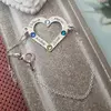 Bratara personalizata - Iubire nelimitata - Inima cu 4 nume gravate si cristale Swarovski - Argint 925, cu lantisor