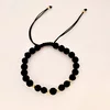 Bratara pietre semipretioase - Lava cu 4 Onix si 6 bilute de 3 mm din Aur 14K - Snur negru rezistent si reglabil