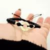 Bratara Roata Norocului  Aur Galben 14 K - cu pietre semipretioase si bilute de Aur 14 K - snur reglabil