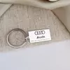 Breloc placuta gravata cu simbolul Audi - Argint 925 - inel otel inoxidabil