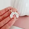 Lantisor personalizat - O stea intre inimi -  Gravura 4 nume - Argint 925
