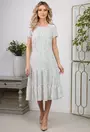 Rochie alba cu buline si volane late