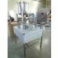 Masina pentru ambalat miere la caserola semiautomata