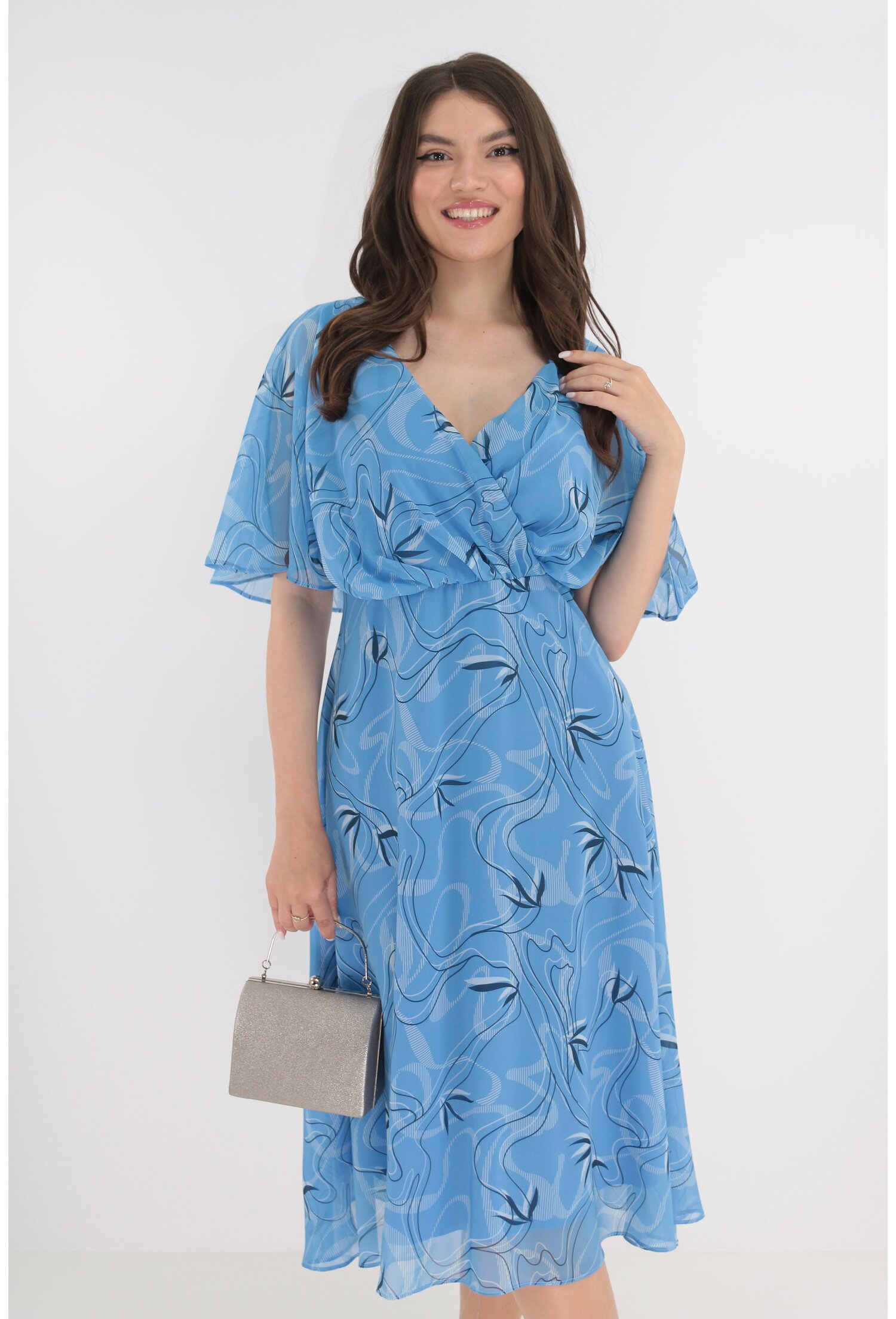 Rochie din voal bleu cu print abstract si decolteu parte peste parte